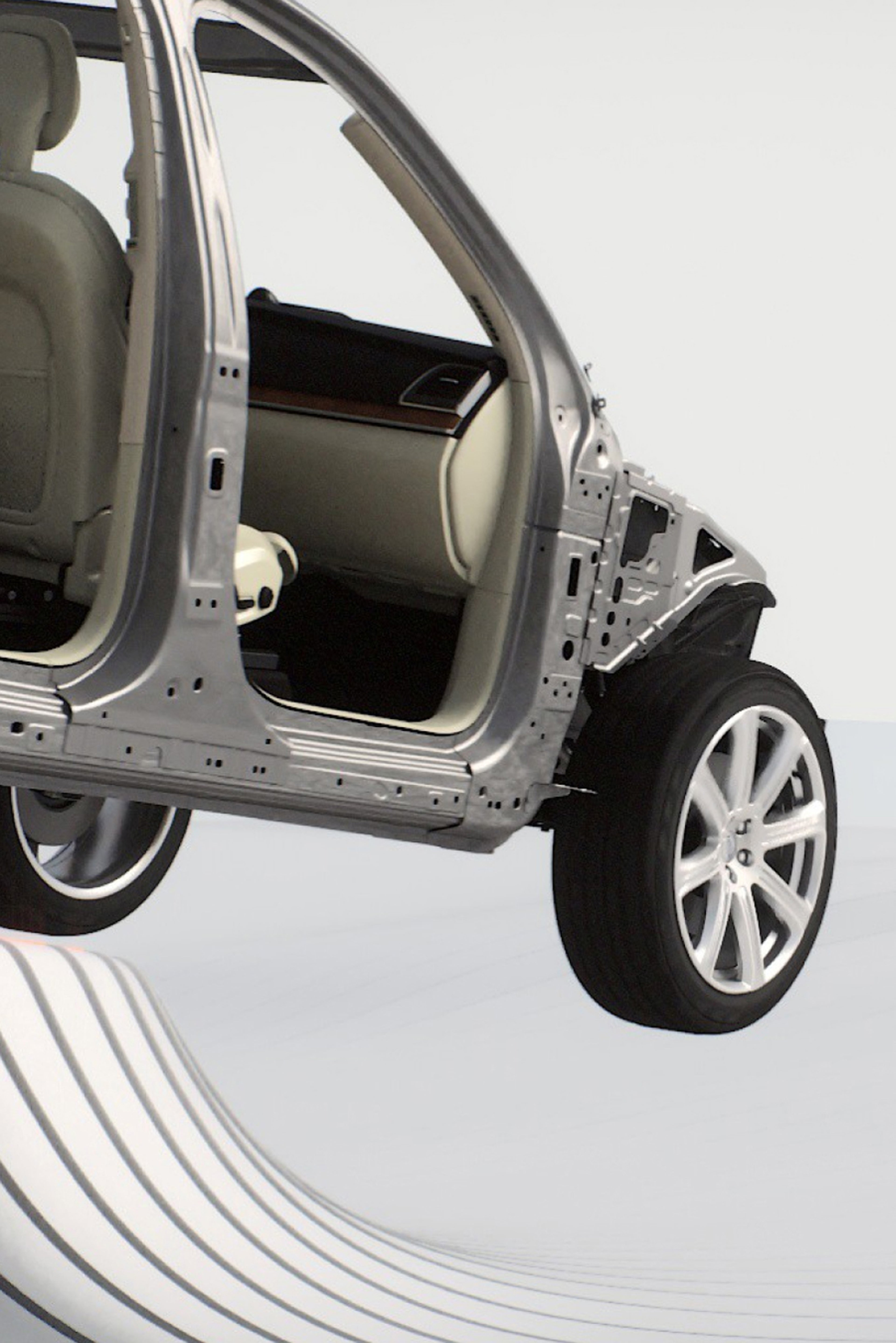 车辆底盘和内部侧视图。车前还有一个灰色和黑色的盒子。