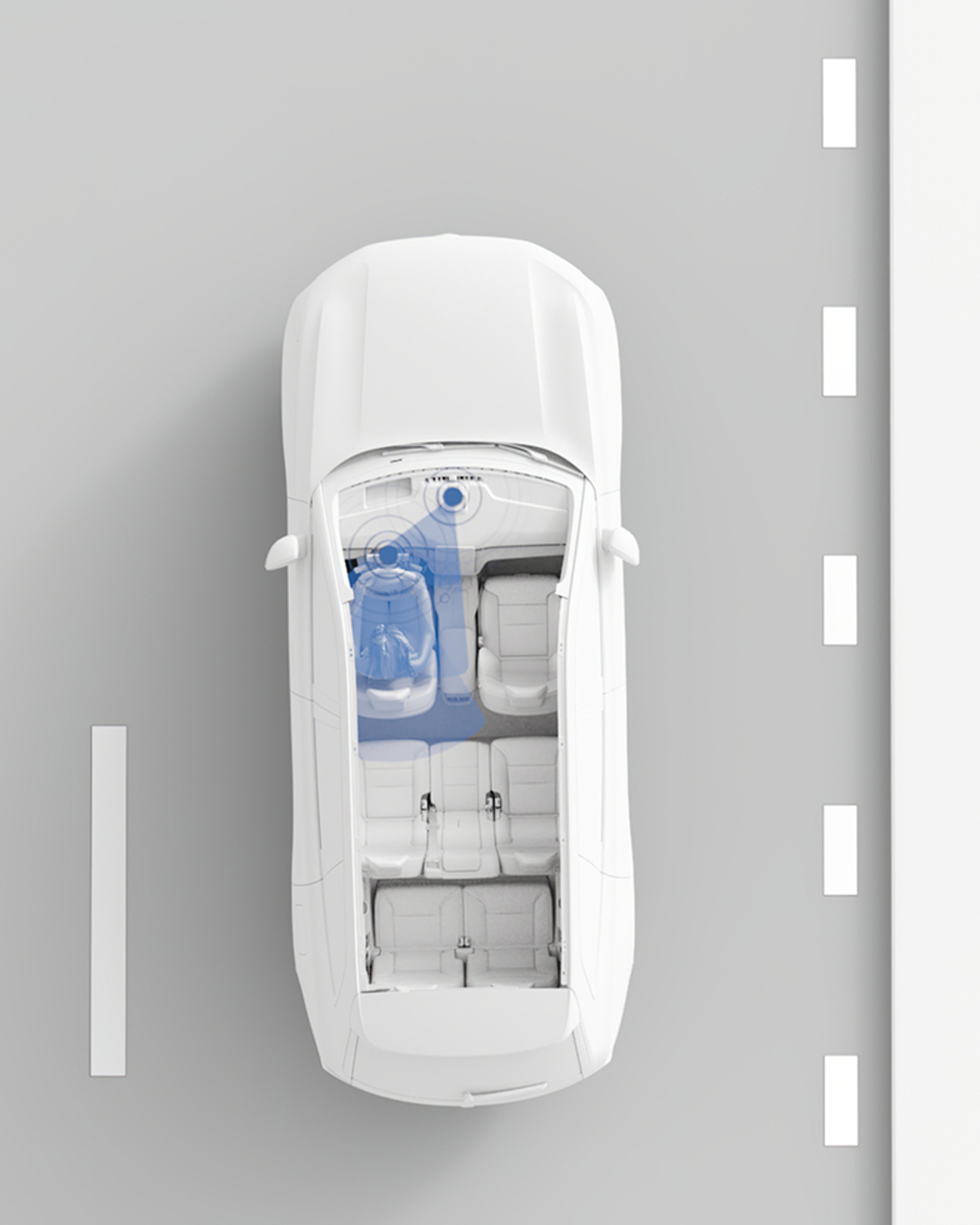 一辆白色沃尔沃在道路上行驶的粘土效果俯视图,蓝色叠加层突出显示了监视驾驶员位置的驾驶员感知系统。