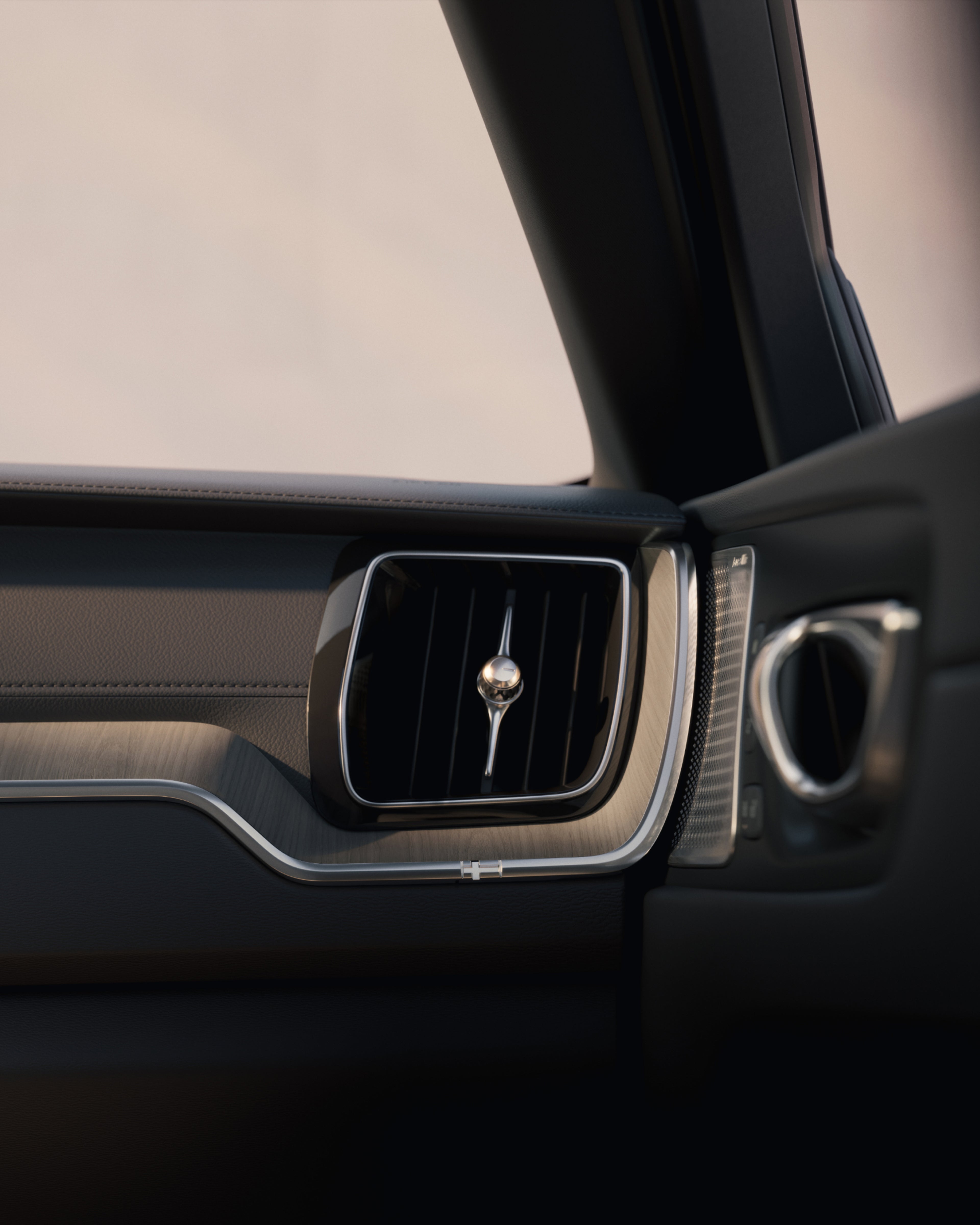 沃尔沃全新 XC60 装饰和通风口处内饰细节特写。