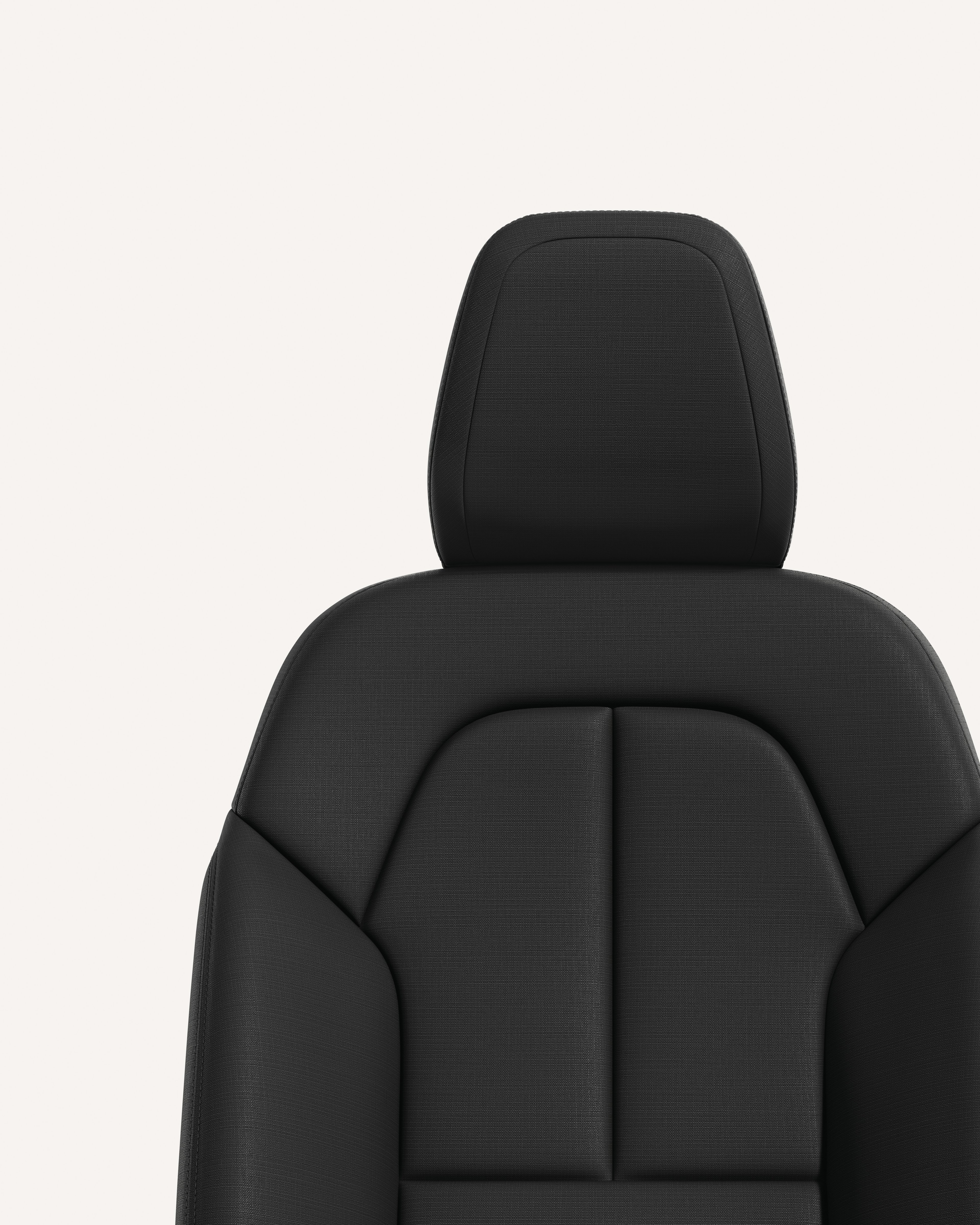 白色摄影棚内炭灰色沃尔沃 XC40 前排座椅内饰特写。