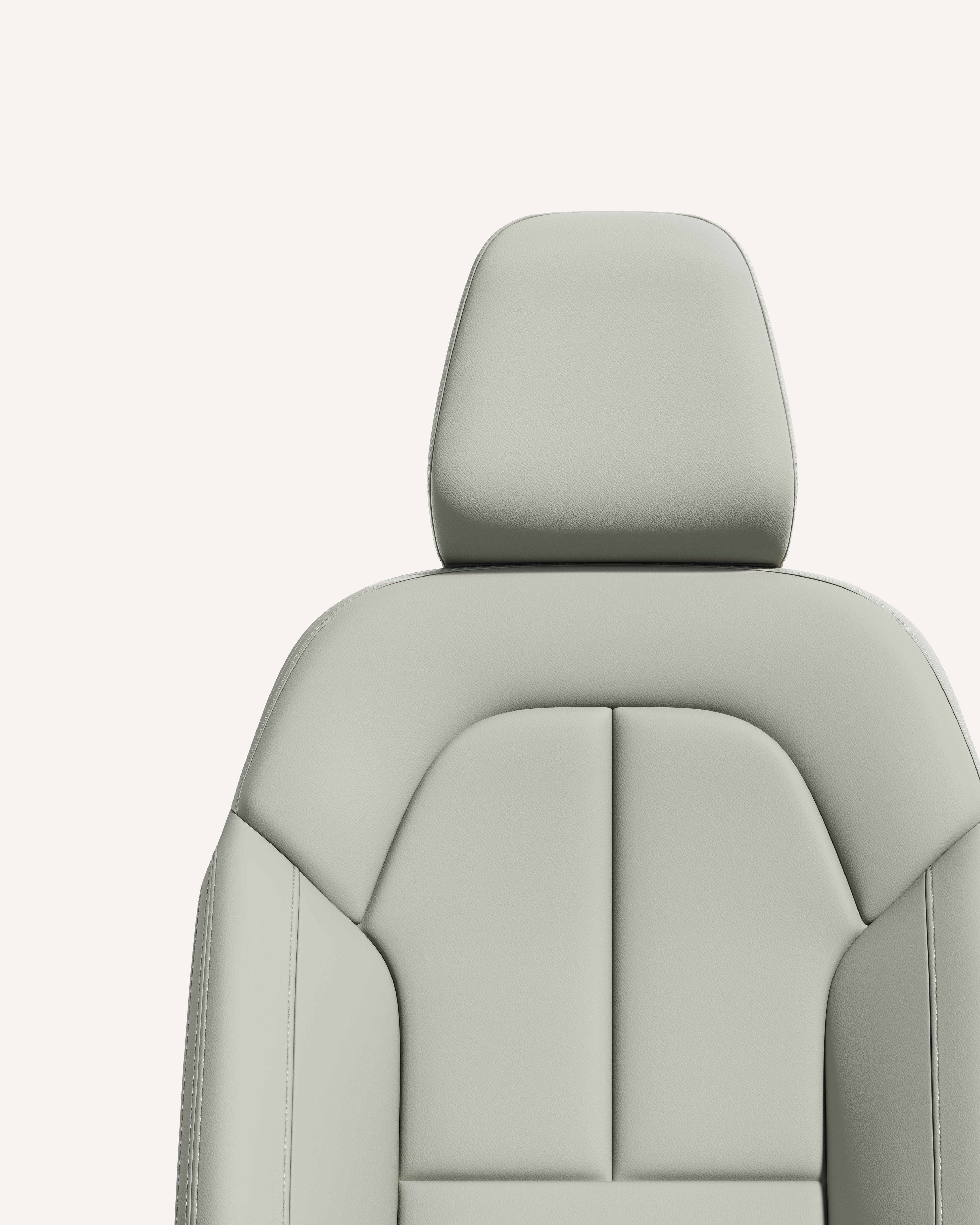 白色摄影棚内米色沃尔沃 XC40 前排座椅内饰特写。