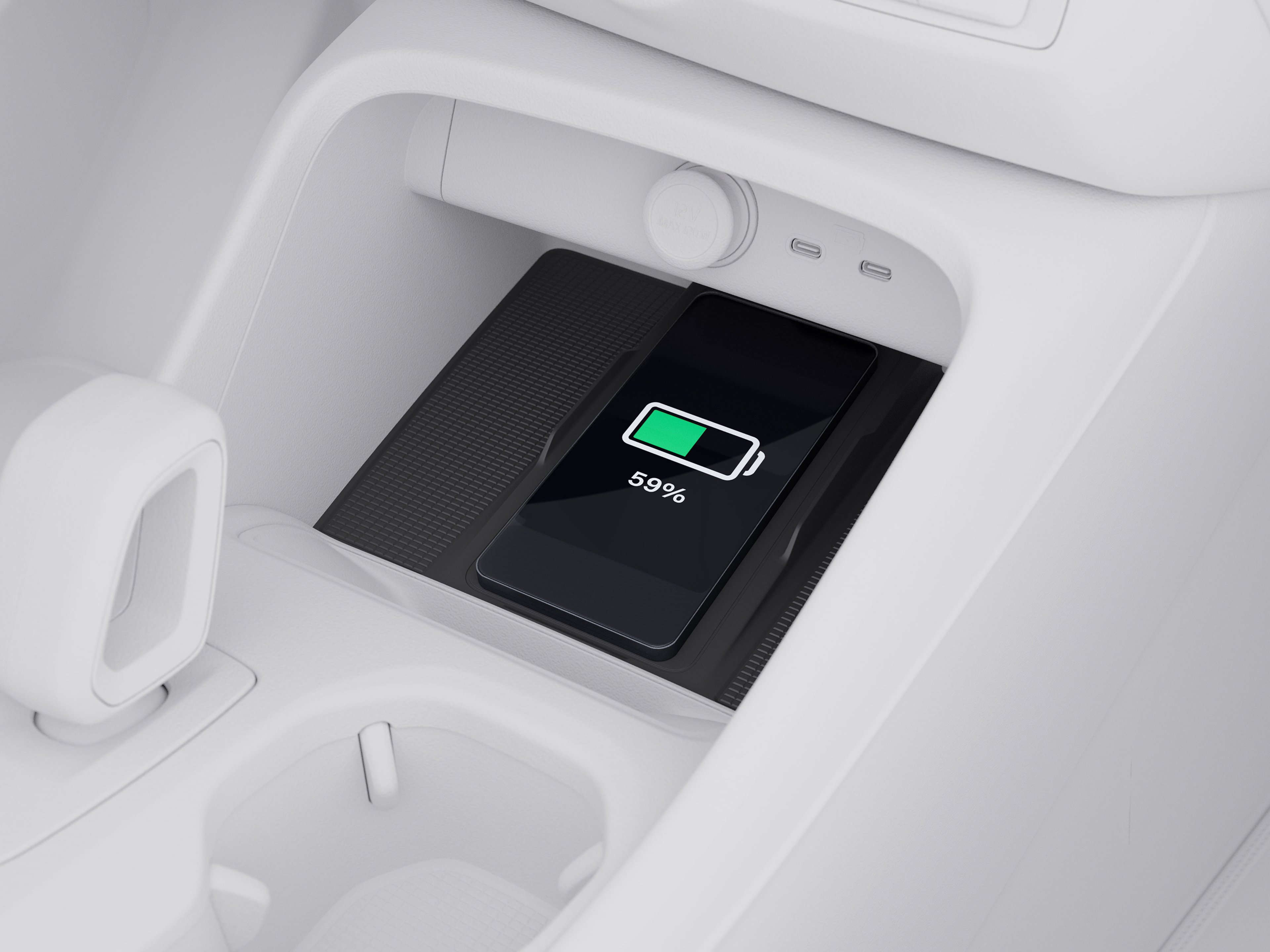 沃尔沃 XC40 中控台俯视图,突出显示充电板。