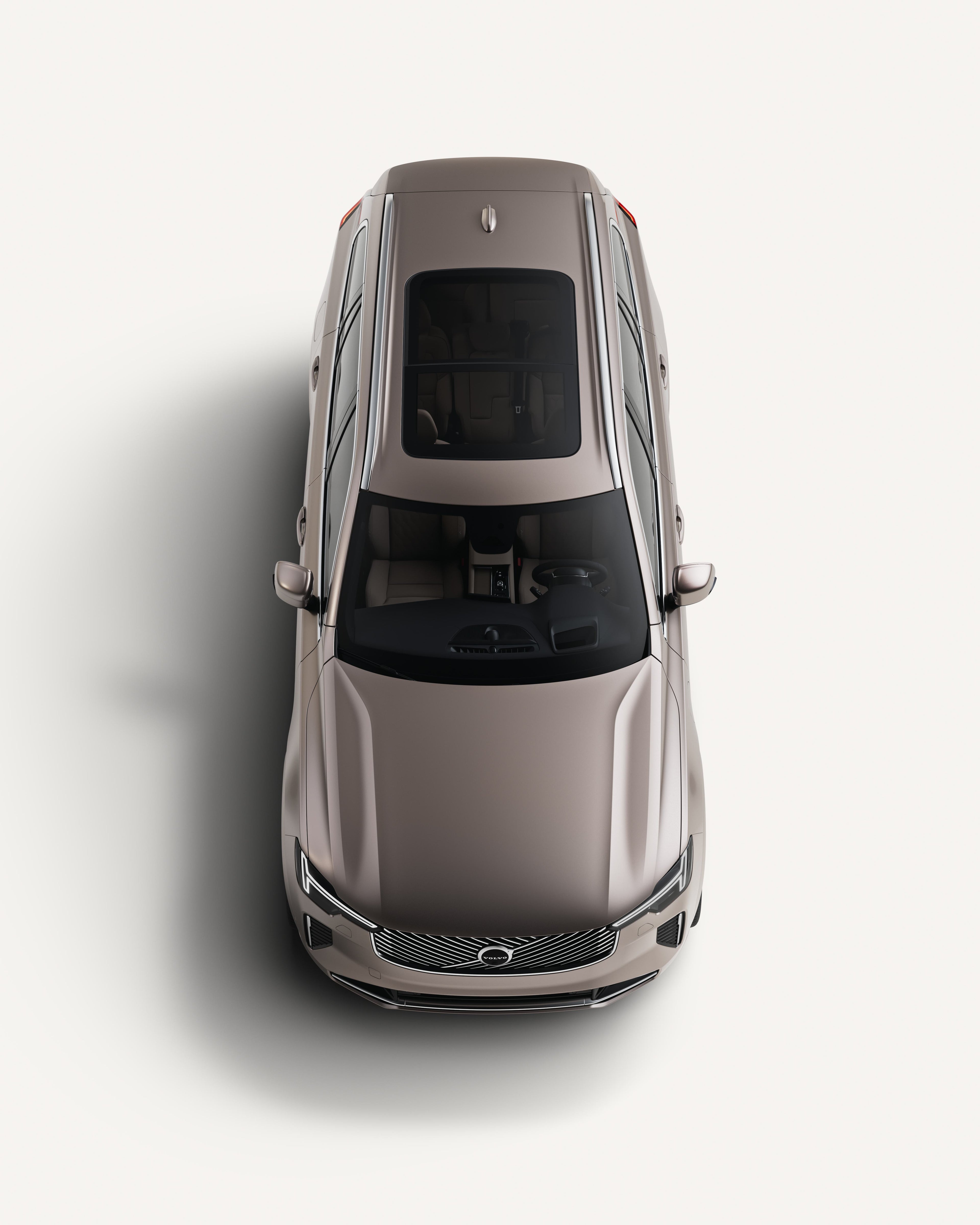 白色摄影棚内沃尔沃 XC90 车顶俯视图。