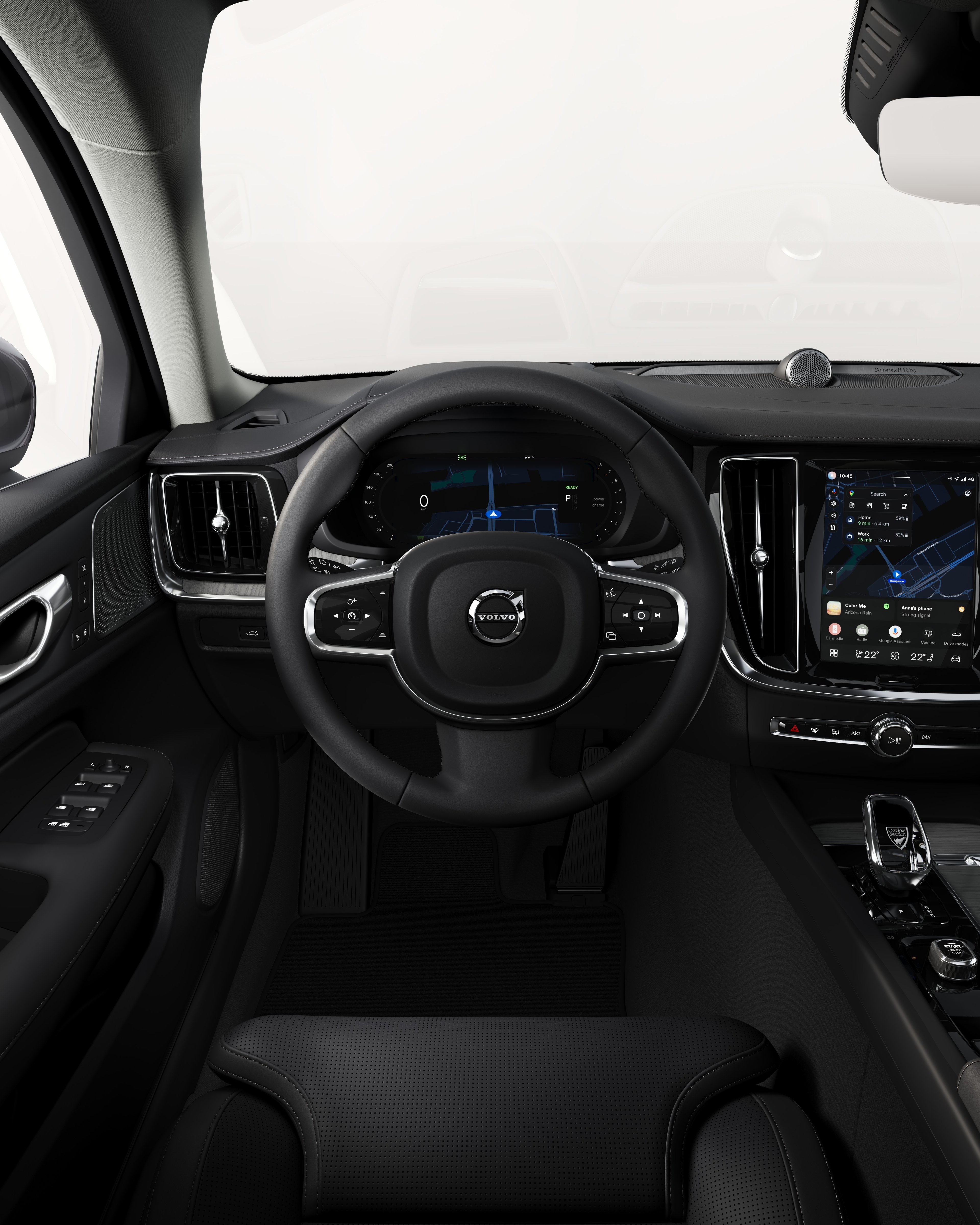 Back seat view of the Volvo V60 dashboard, including steering wheel and touchscreen.