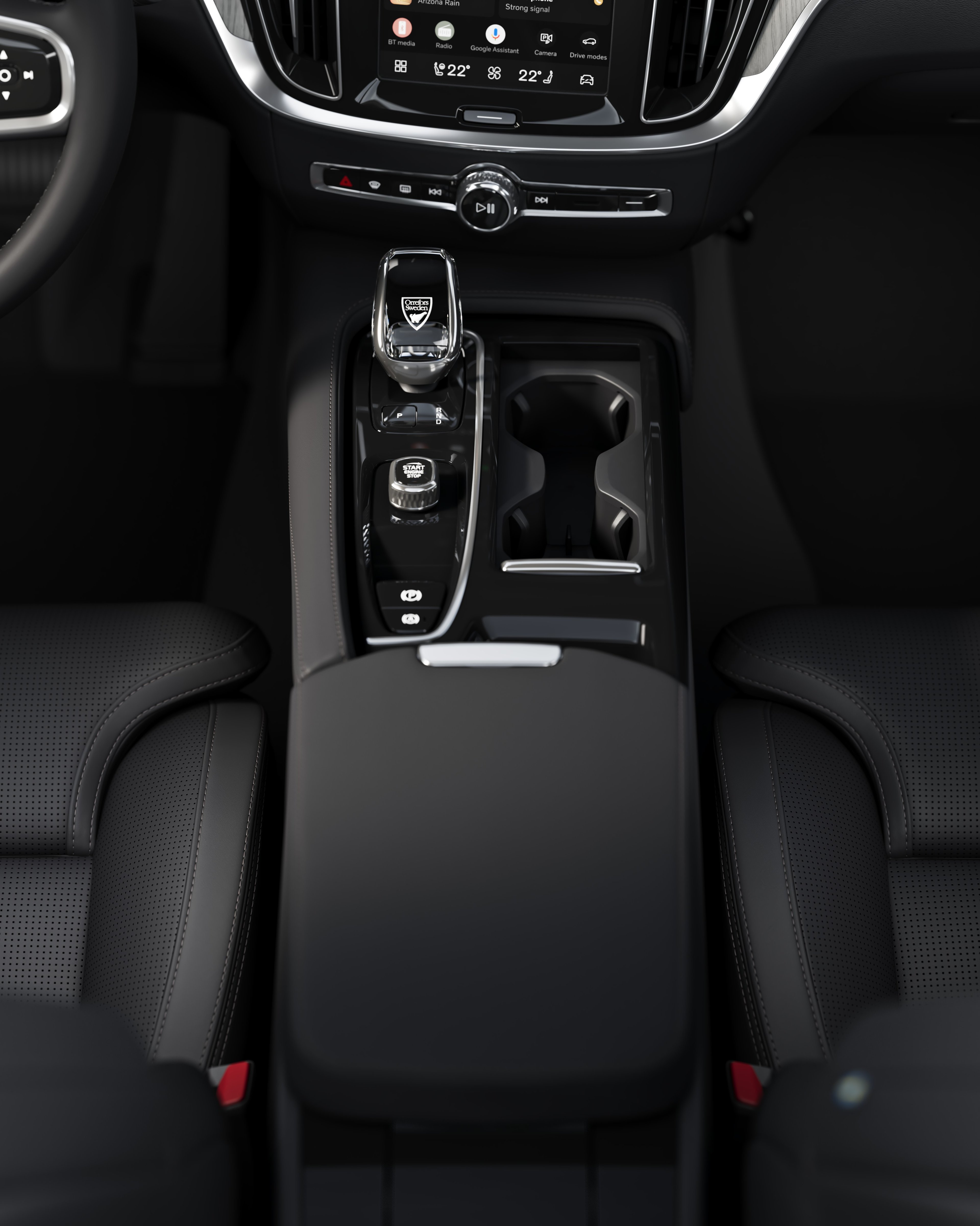 沃尔沃 V60 中控台特写,包括杯架和换挡杆。