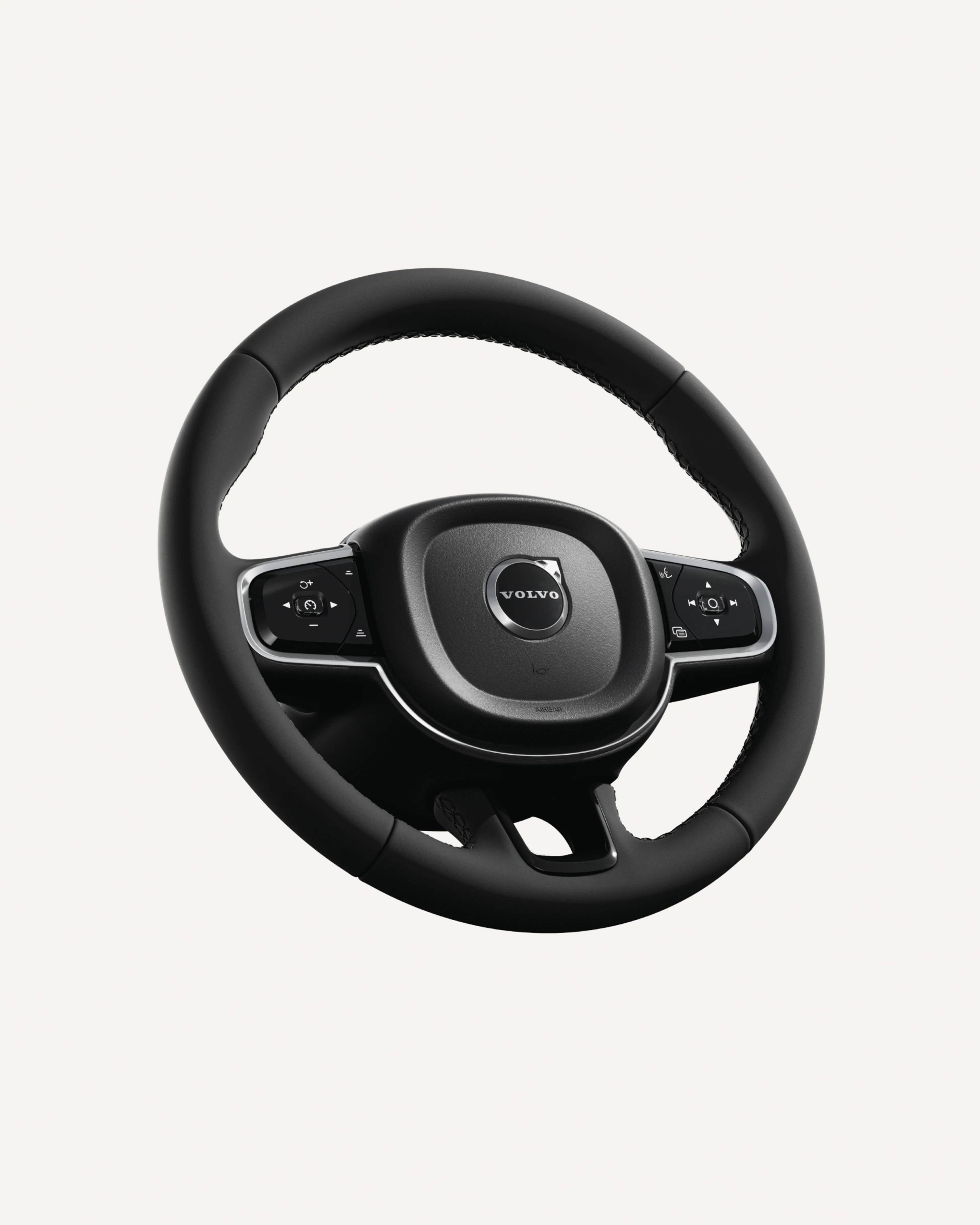 沃尔沃全新 XC60 方向盘特写,突显其多功能集成按键。
