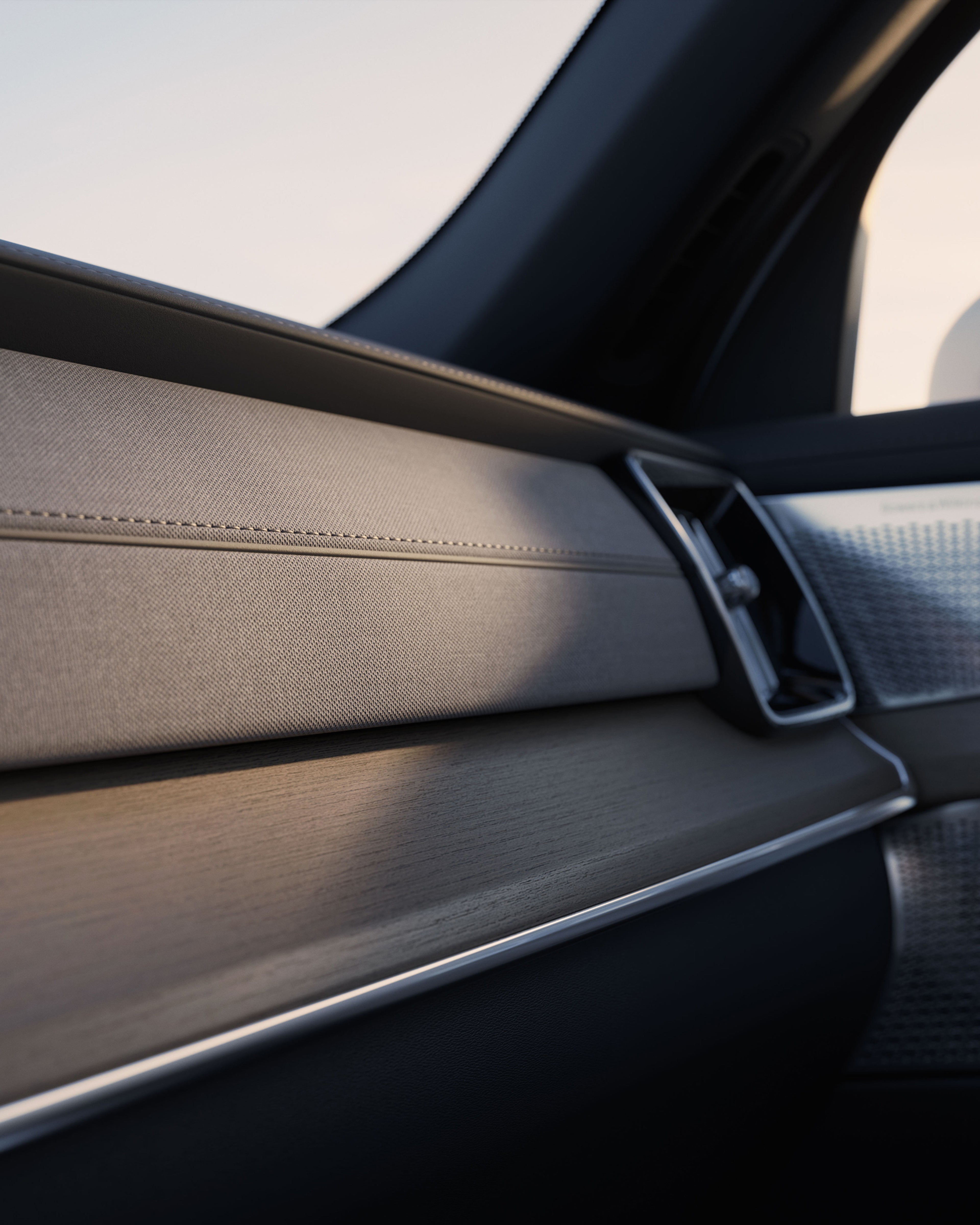 沃尔沃 XC90 仪表盘特写,展示简约的装饰和细腻的照明