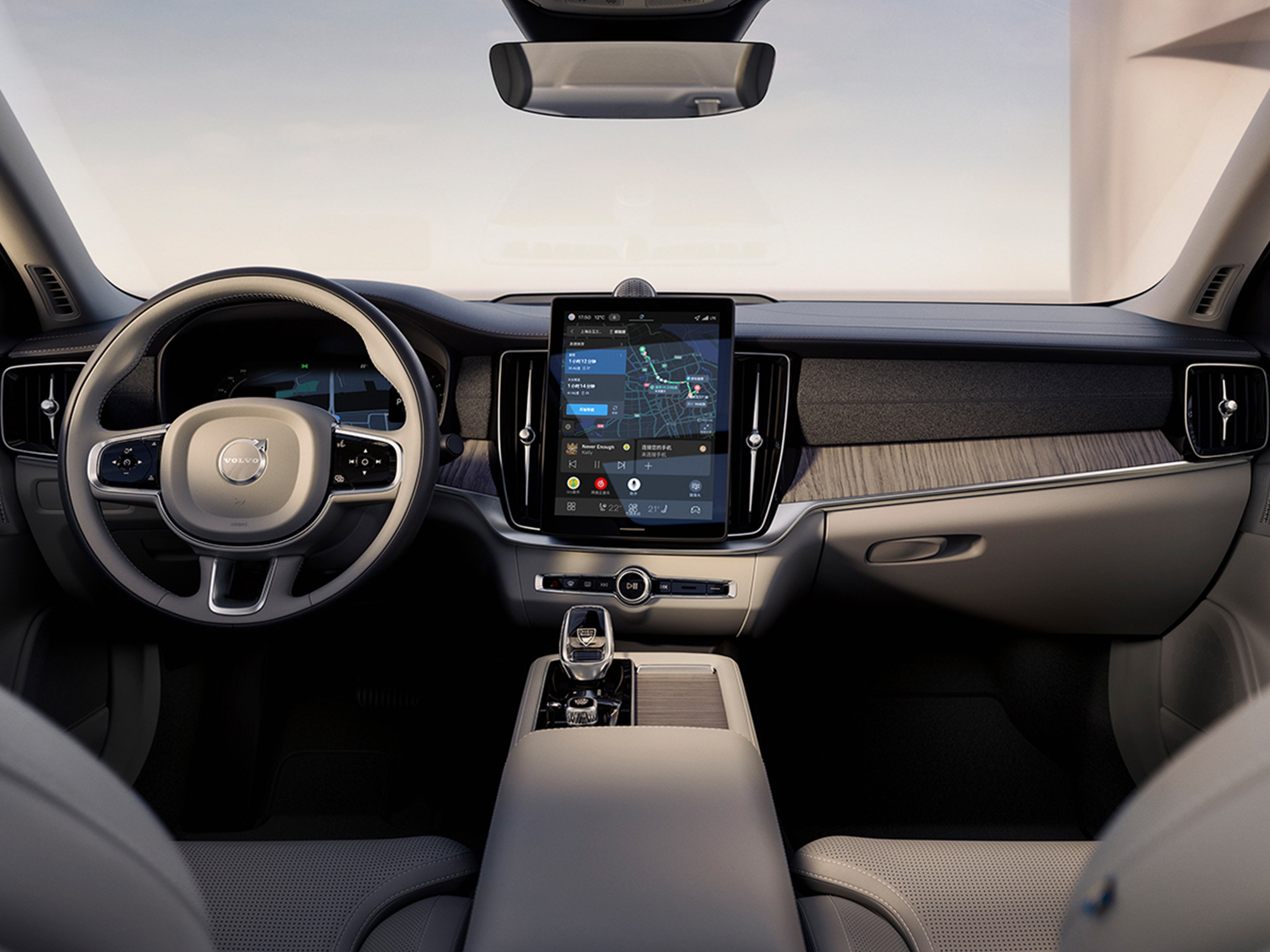 沃尔沃轿车仪表盘、中央显示屏、换挡杆、驾驶员显示屏和方向盘。