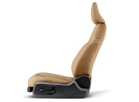 A Volvo car seat in brown leather.